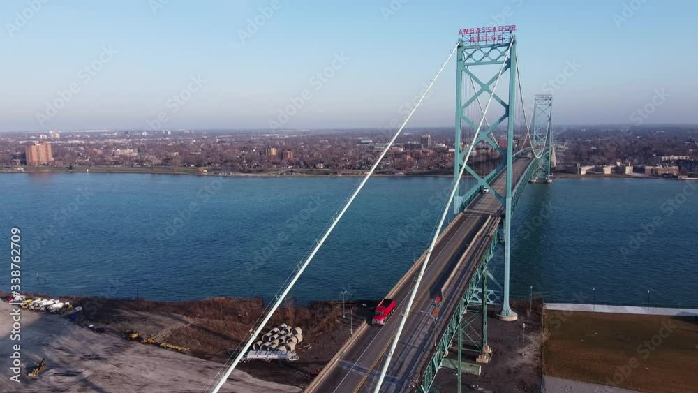 Ambassador Bridge Across The Detroit River in Detroit Michigan, Over Looking The City Of Windsor, Canada.-wide shot Ambassador Bridge Across The Detroit River in Detroit Michigan, Over Looking The City Of Windsor, Canada.-wide shot