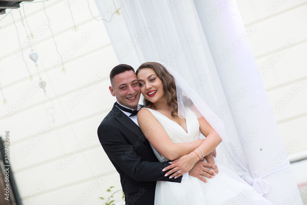 Beautiful wedding couple posing outdoor Beautiful wedding couple posing outdoor