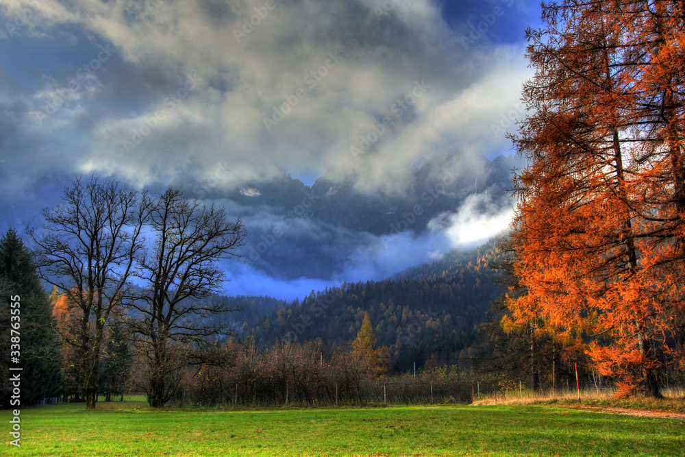 High Alpine mountains rising through the clouds High Alpine mountains rising through the clouds