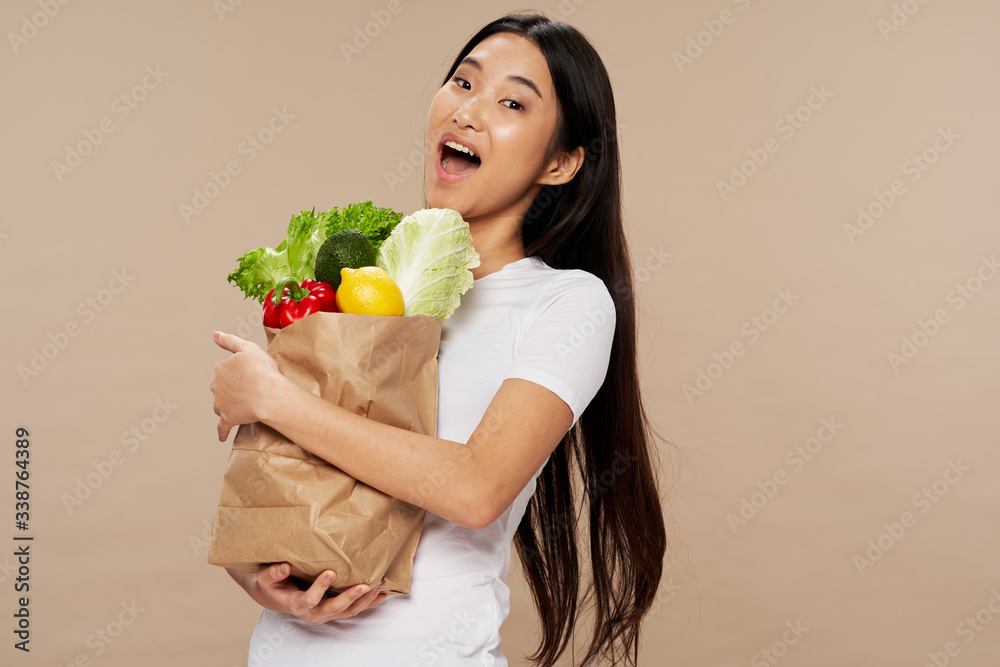 young woman with vegetables young woman with vegetables