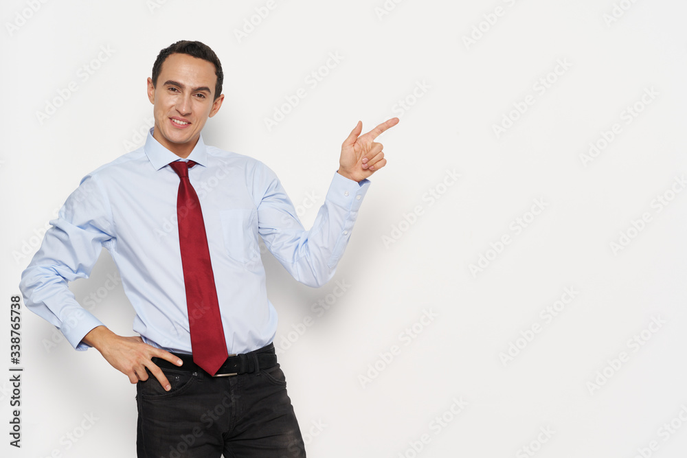 young businessman pointing