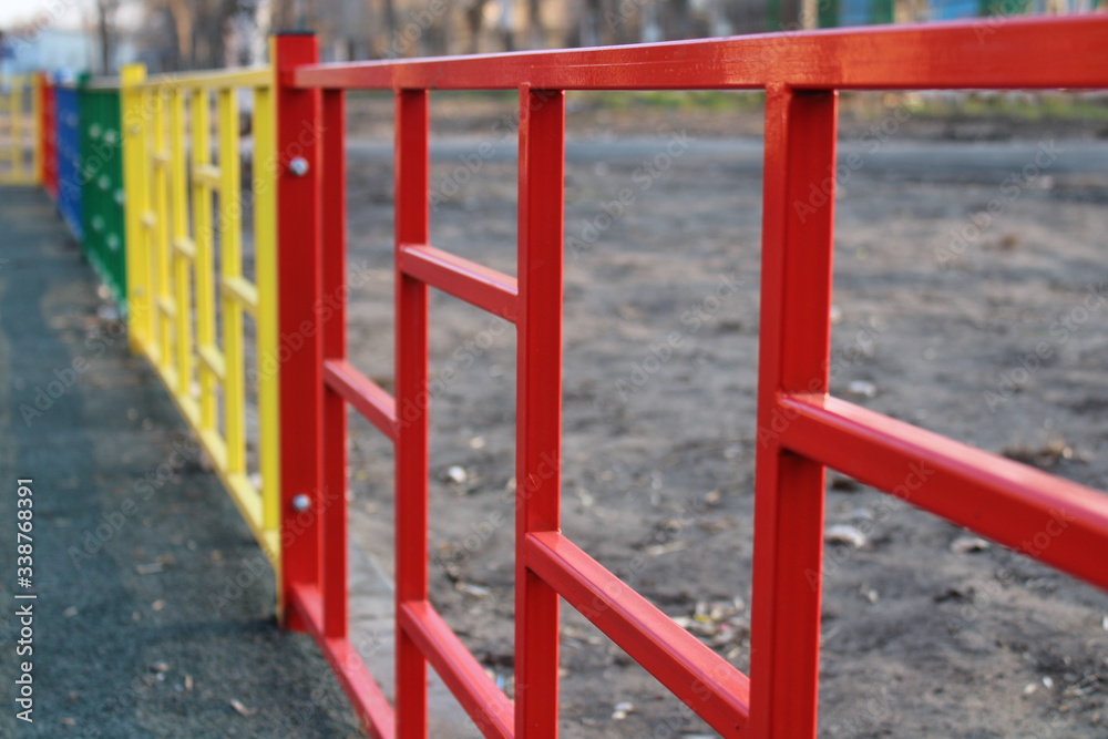 multi-colored fence on the Playground multi-colored fence on the Playground