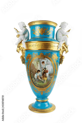 antique blue ceramic vase with angels on white background, vintage
