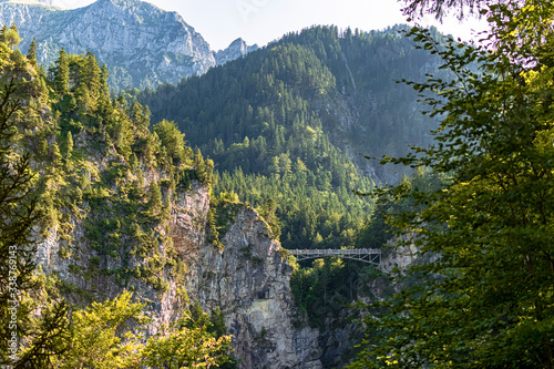View of the beautiful Marienbrücke bridge in the middle of the Alps. Photograph taken in Schwangau, Bavaria, Germany. photo