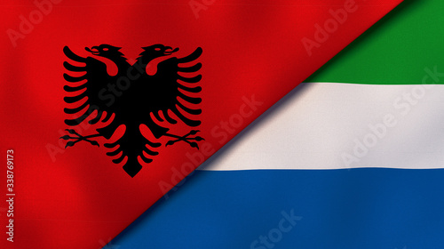 The flags of Albania and Sierra Leone. News, reportage, business background. 3d illustration photo