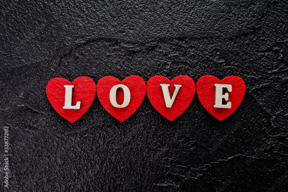 red hearts on black. concept of valentine day, love, wedding. red hearts on black. concept of valentine day, love, wedding.