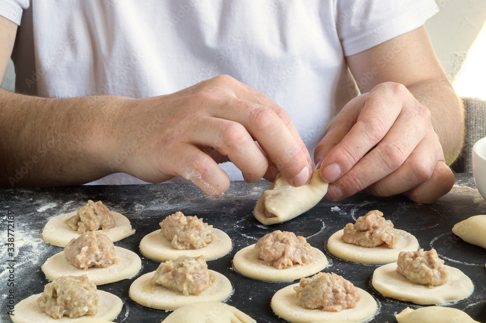 dough rolled out for cooking dumplings. dough rolled out for cooking dumplings.