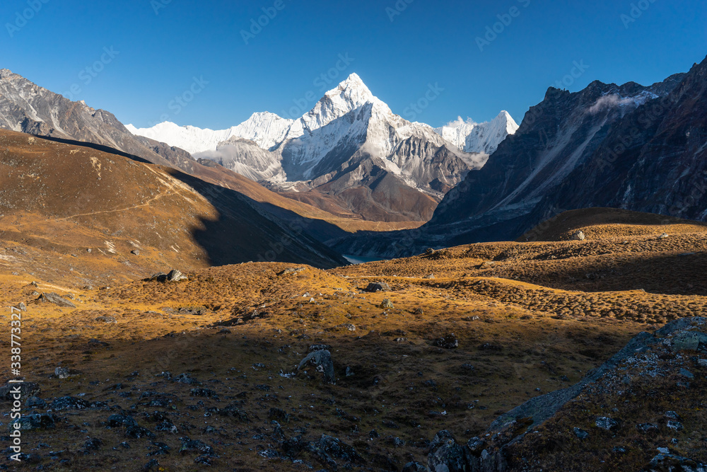 Ama Dablam mountain peak view from Dzongla village before cross Chola pass in Everest region, Himalaya mountains range in Nepal