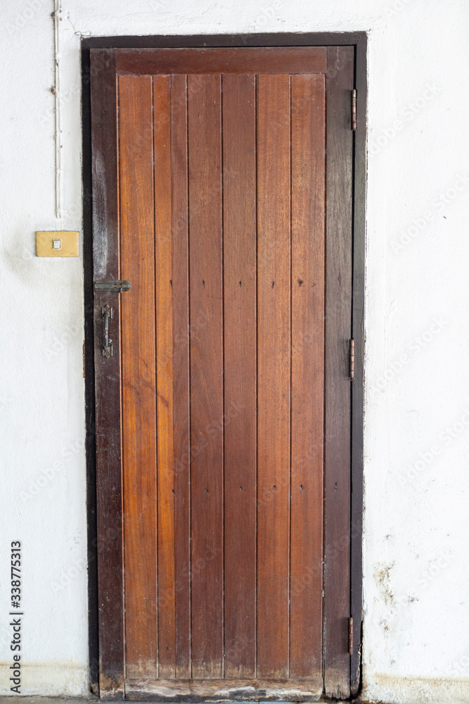 Old wooden doors that are closed