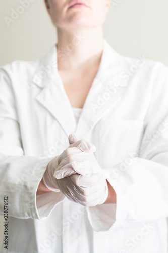 Doctor with white gloves