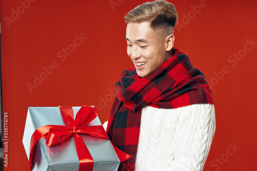 young man with gift © SHOTPRIME STUDIO