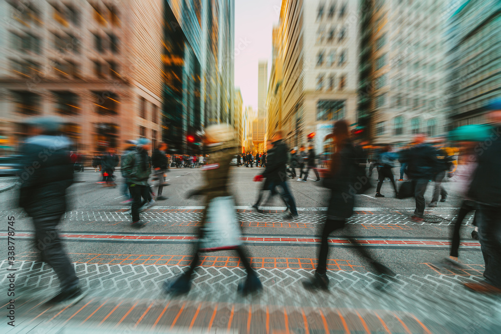 Motion blur people walking pass door of old building in rush hour  representing urban life Stock Photo - Alamy