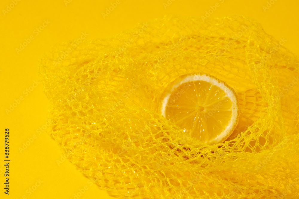 cross section lemon yellow slice background close-up net netting packing package