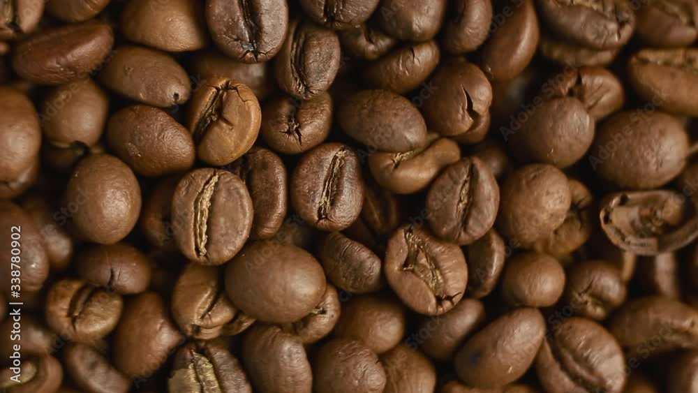 Top view roasted coffee beans close-up. Mixed dark coffee close-up Top view roasted coffee beans close-up. Mixed dark coffee close-up