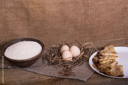 Hot, baked pancakes with eggs and flour, in a village style