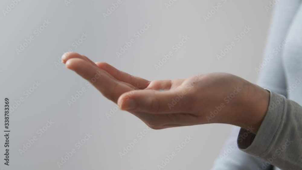 hygiene, health care and safety concept - close up of woman spraying antibacterial hand sanitizer hygiene, health care and safety concept - close up of woman spraying antibacterial hand sanitizer