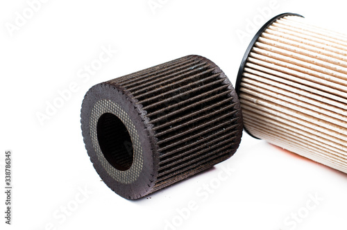 Old  and new oil filter isolated on white background.Copy space