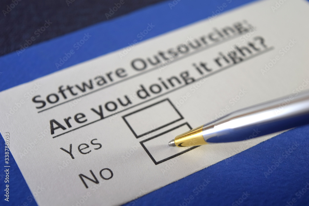 One person is answering question about software outsourcing. One person is answering question about software outsourcing.