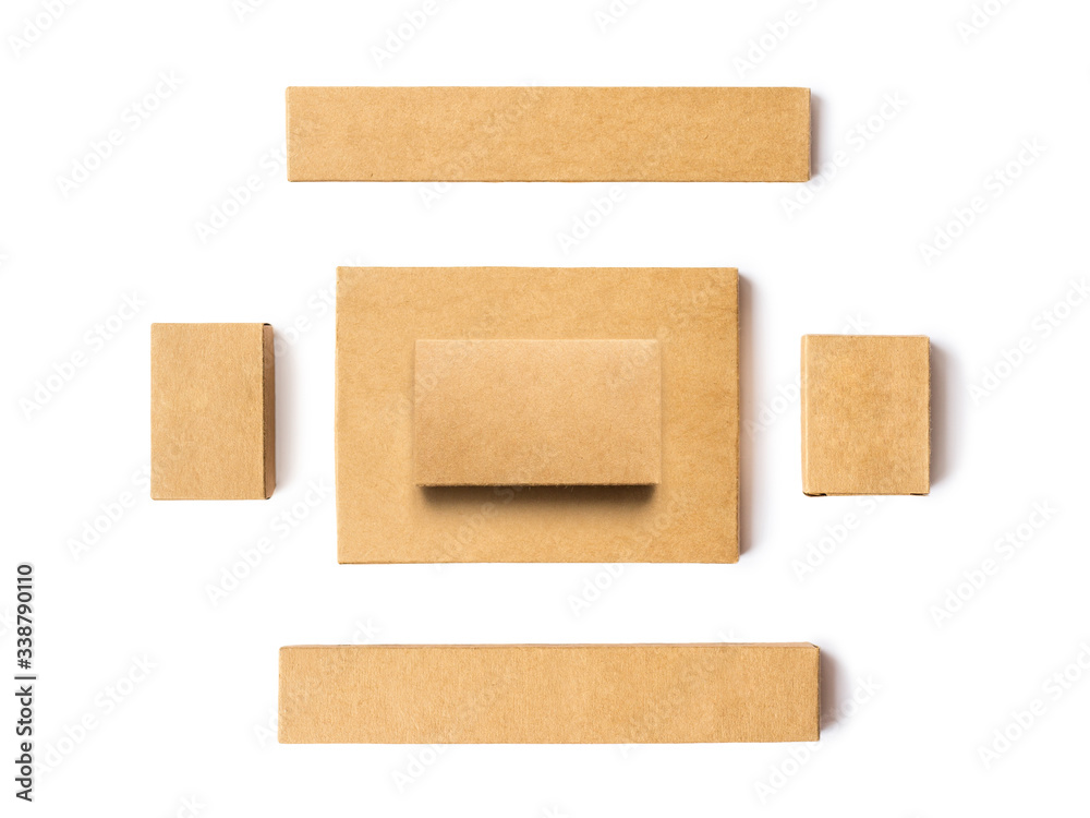 Top view of small blank kraft boxes isolated on a white background. Flat lay of group of corrugated cardboard boxes Top view of small blank kraft boxes isolated on a white background. Flat lay of group of corrugated cardboard boxes