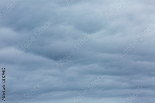 Cloudy gloomy blue sky. Background. Space for text.