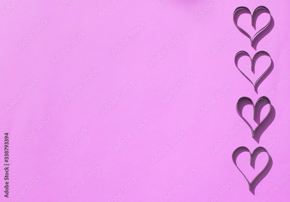Pretty Pink Paper Hearts on Coloured background