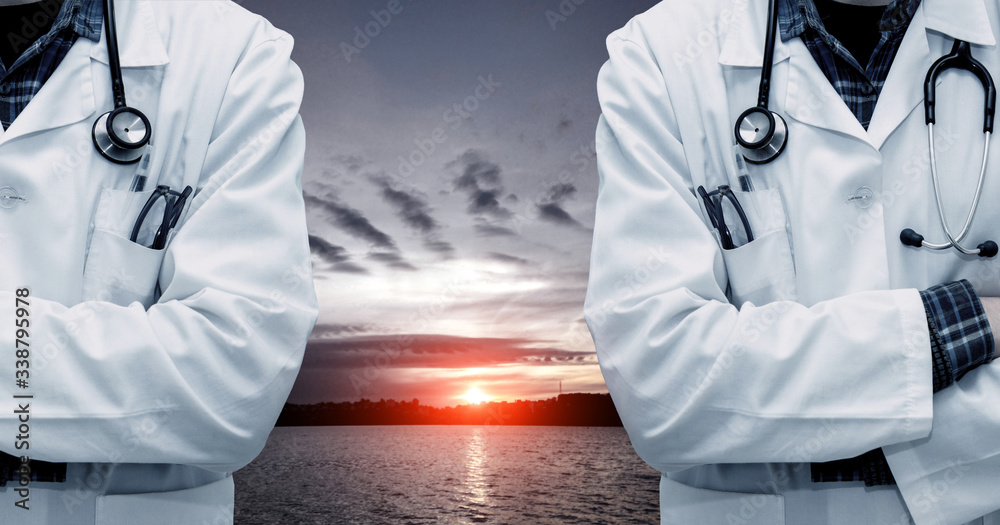 Abstract sad dramatic picture with sunset over the lake and resuscitation doctors (death, loss, coronavirus - concept)