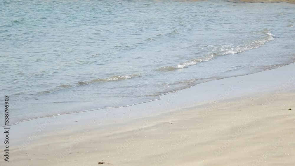 SLOW MOTION:beautiful
small sea waves on a sandy beach SLOW MOTION:beautiful
small sea waves on a sandy beach