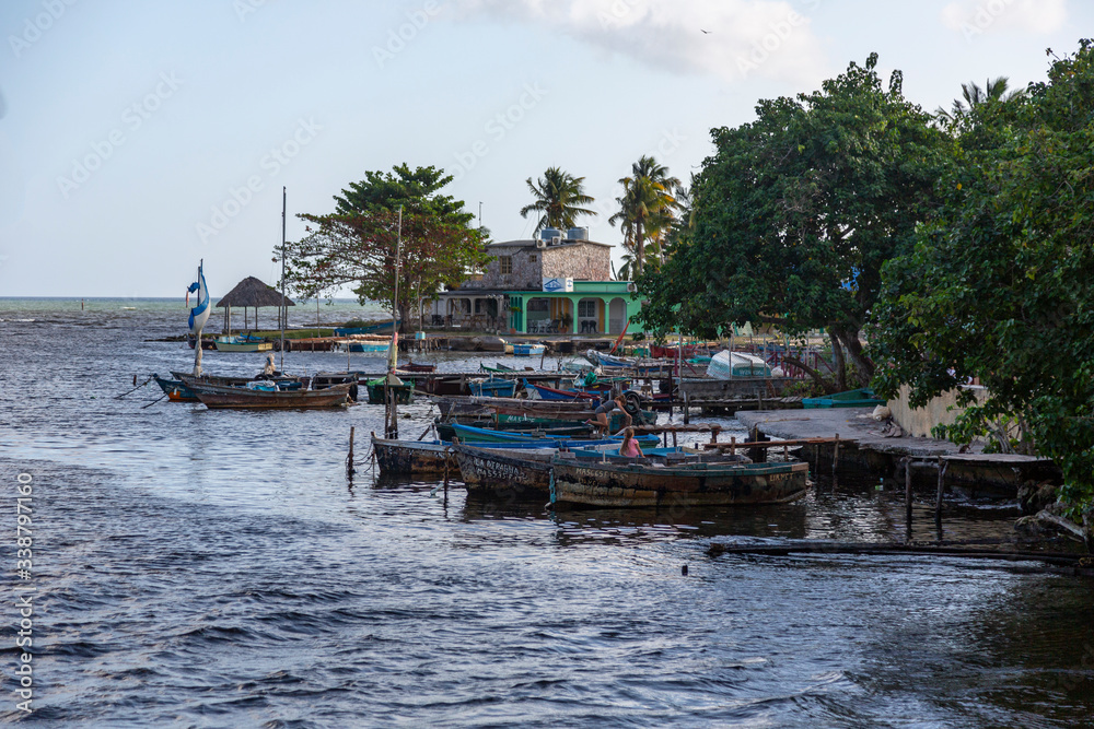 Some boats are floating in the pier of Playa Larga, a little town in the south of Cuba Some boats are floating in the pier of Playa Larga, a little town in the south of Cuba
