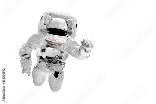 astronaut flies over the in space masked with the image of the flag Coronavirus and Air pollution pm2.5 concept. COVID-19.