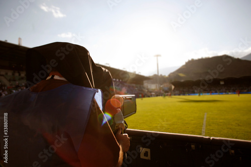 TV camera at the stadium during football matches photo