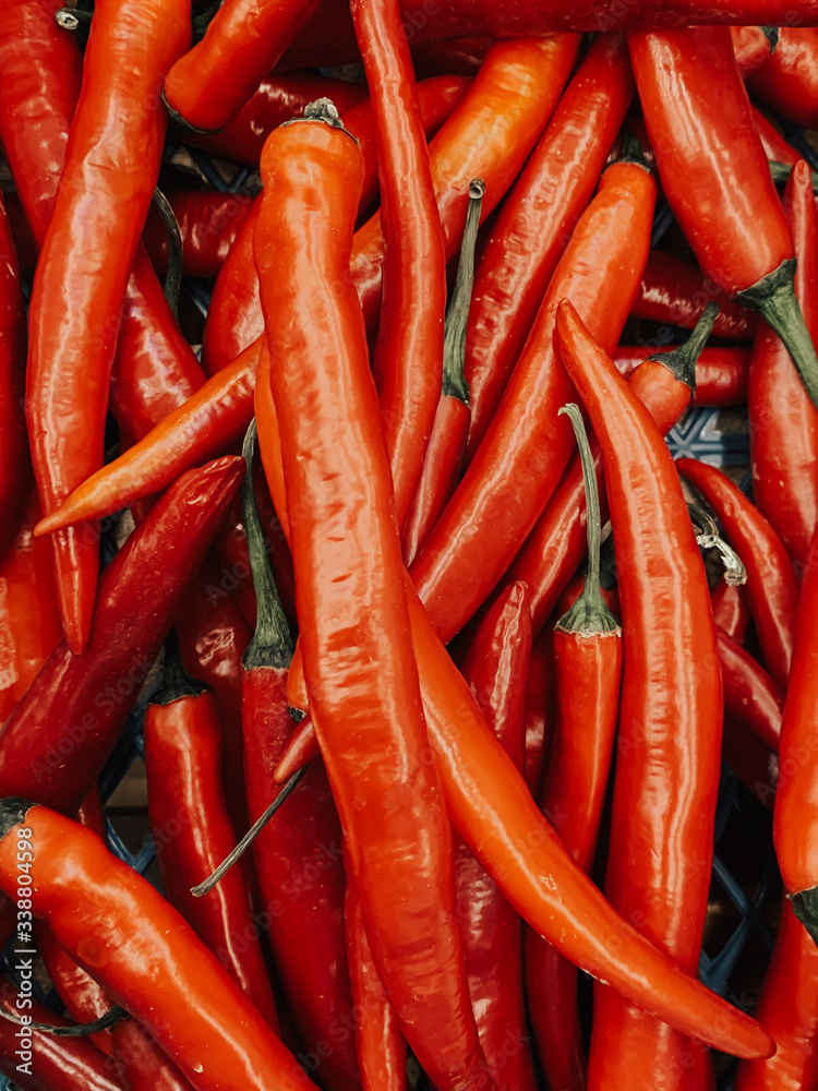 lots of spicy hot red peppers for eating background lots of spicy hot red peppers for eating background