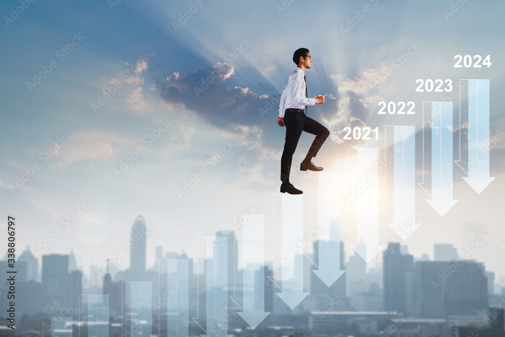 successful business way in new year 2021, how to success and be achievement, focus to goal concept, young businessman walking and looking out to develop working life to leader, climbing stairs successful business way in new year 2021, how to success and be achievement, focus to goal concept, young businessman walking and looking out to develop working life to leader, climbing stairs