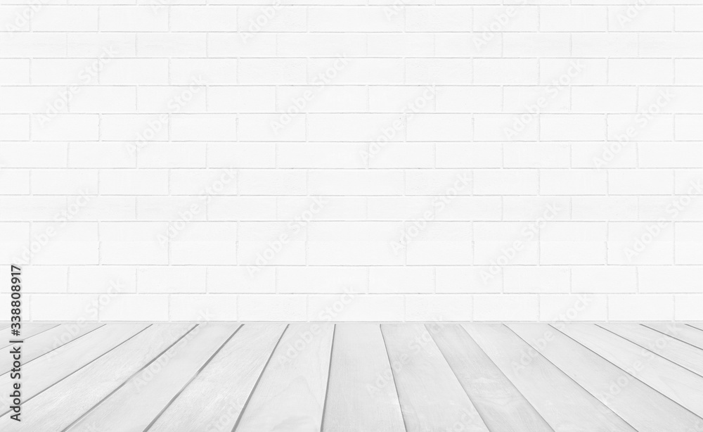 Vintage interior room with white wood floor and brick wall background