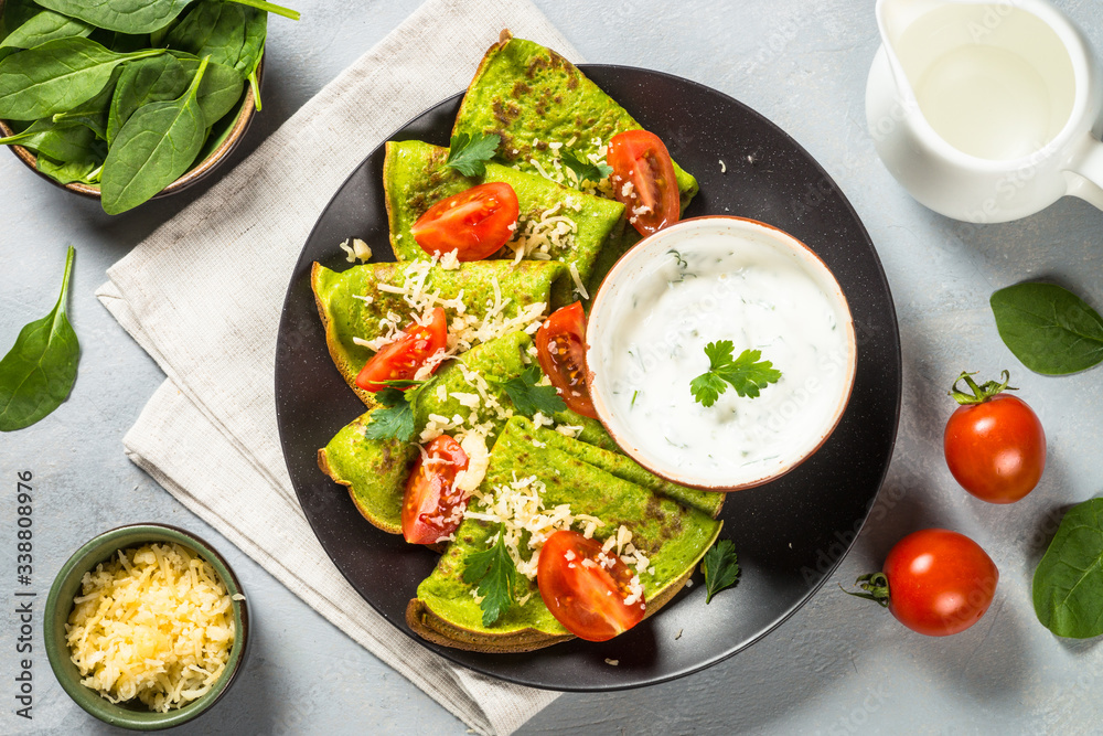 Green pancakes from spinach top view. Green pancakes from spinach top view.