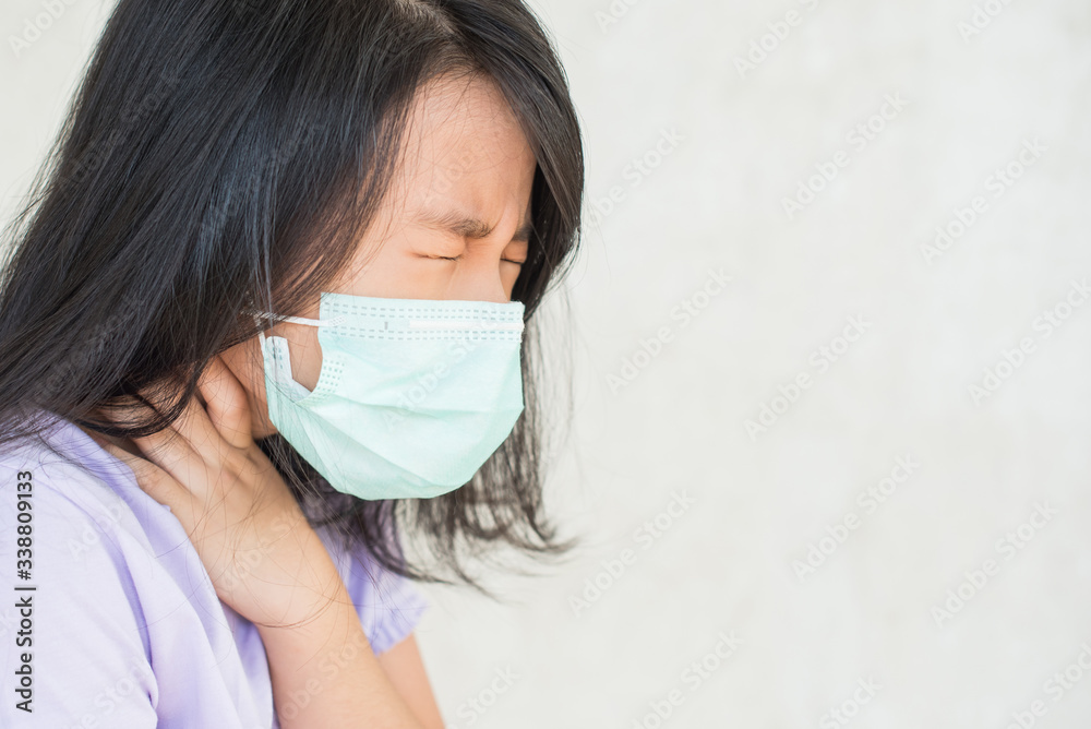 asia women wearing hygienic mask to prevent the virus PM2.5, Coronavirus, (2019-nCoV) asian little girl feeling unwell and coughing as symptom for cold or pneumonia,bronchitis. healthcare concept. asia women wearing hygienic mask to prevent the virus PM2.5, Coronavirus, (2019-nCoV) asian little girl feeling unwell and coughing as symptom for cold or pneumonia,bronchitis. healthcare concept.