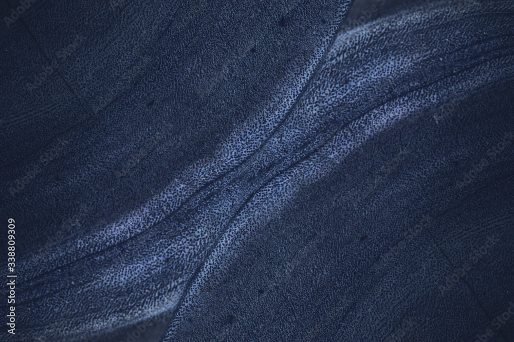 Naklejka premium Dark textured stone background