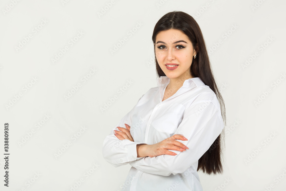 beautiful young woman in a white shirt on a white background beautiful young woman in a white shirt on a white background