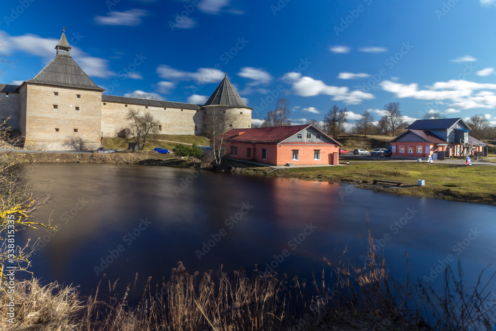 Staroladozhskaya fortress in the village of Staraya Ladoga on the banks of the Volkhov River. Historic places of Russia. Great walls, roofs for protection. Panorama