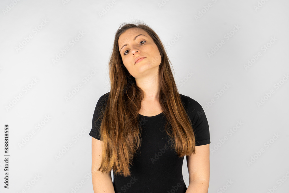 Young woman in black shirt with long hair Young woman in black shirt with long hair