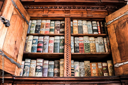 Very old books on the shelf, a fantastic look at history and tradition in a very old library