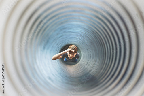 boy fallen into a giant spring and hopes to find someone to help him