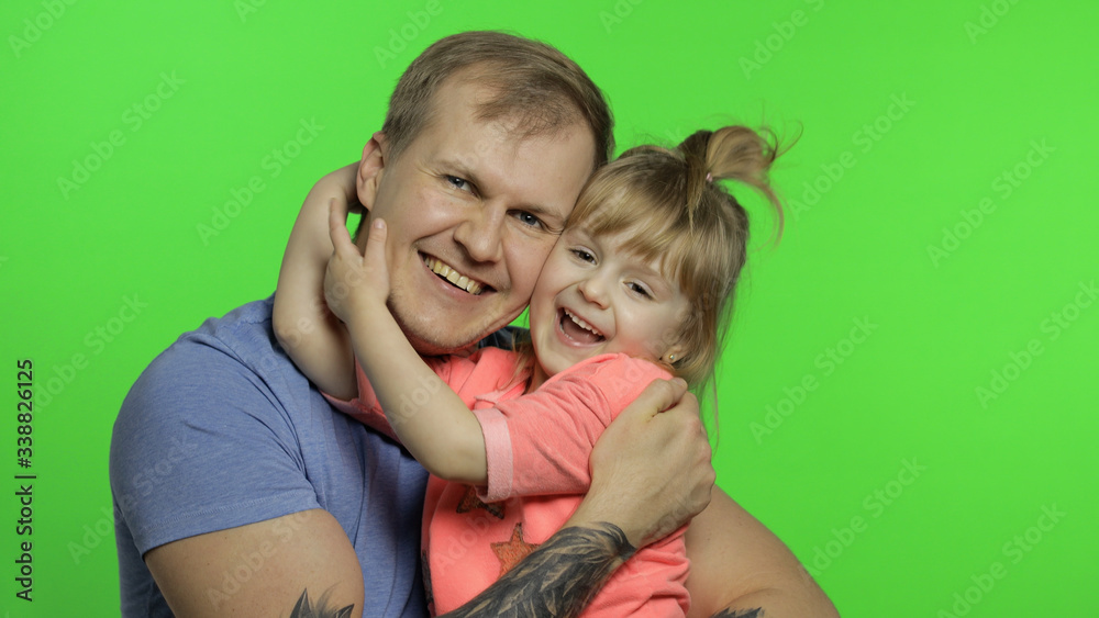 Father and little daughter hugging each other. Chroma Key. Fathers day Father and little daughter hugging each other. Chroma Key. Fathers day