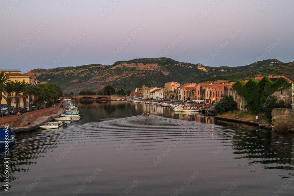 Romantic village with river at Sardinia at dusk