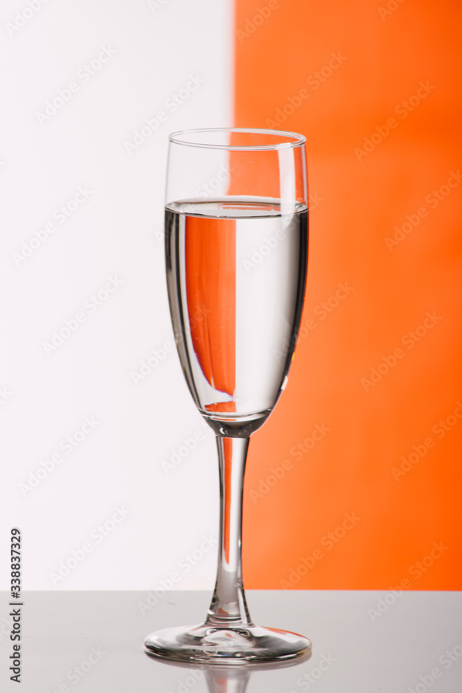 Three glasses of wine against colorful background Three glasses of wine against colorful background
