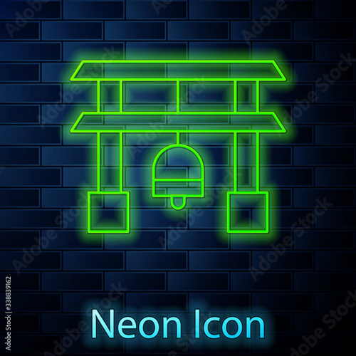 Glowing neon line Japan Gate icon isolated on brick wall background. Torii gate sign. Japanese traditional classic gate symbol.  Vector Illustration