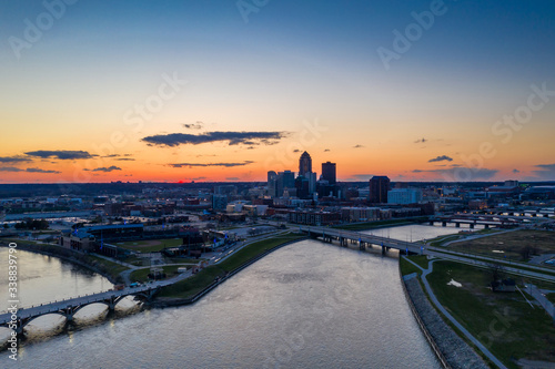 Sunset over the Des Moines Skyline and the Confluence of the Des Moines and Racoon Rivers photo