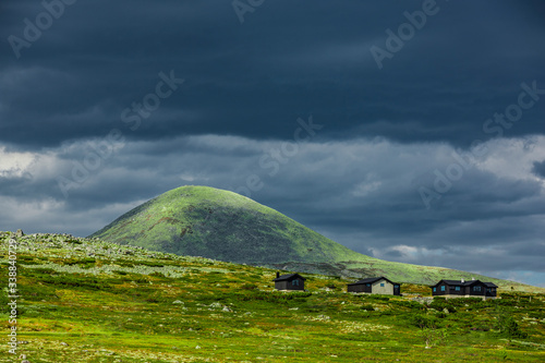 Wolken über dem Berggipfel Muen im Rondane Nationalpark, Norwegen