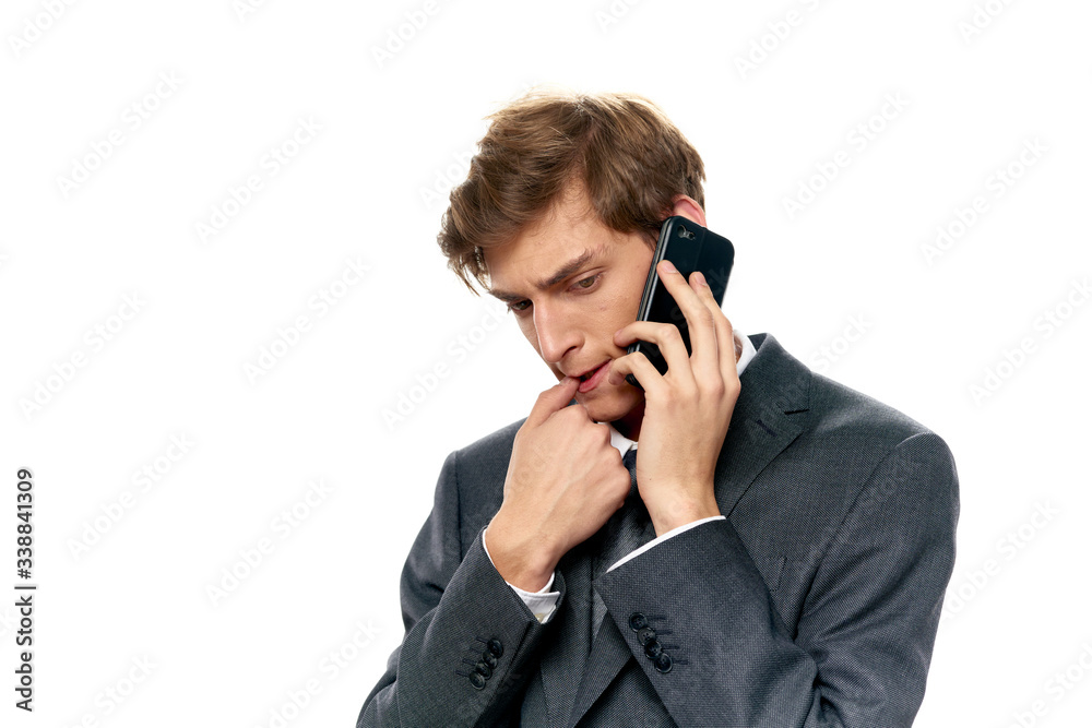young businessman talking on the phone young businessman talking on the phone