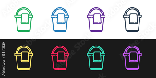 Set line Bucket with rag icon isolated on black and white background. Cleaning service concept.  Vector Illustration