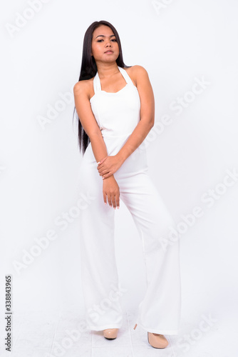 Full body shot of young Asian businesswoman
